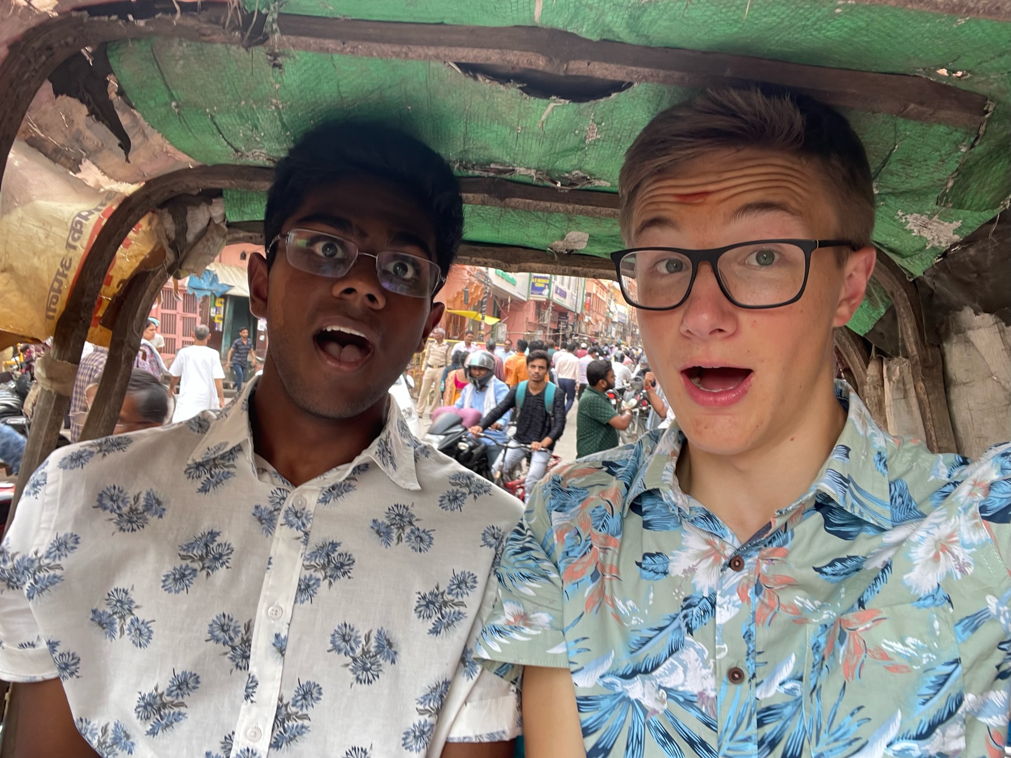 My friend Muthu and me riding a bike rickshaw in Varanasi